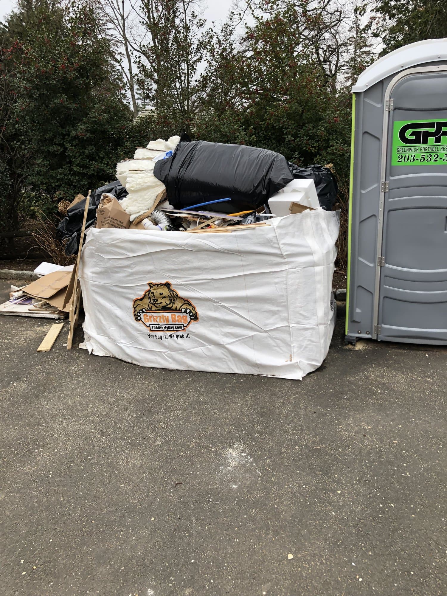 Filled Grizzly Bag ready for haul-away from a driveway