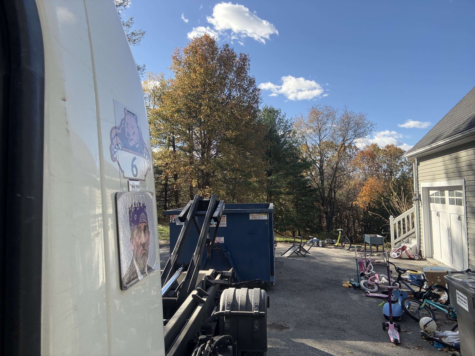 dumpster truck jobsite in Greenwich, CT by Grizzly Junk Pros